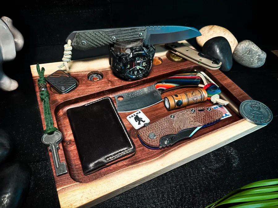 Layer Cake on a desk holding a full everyday carry loadout
