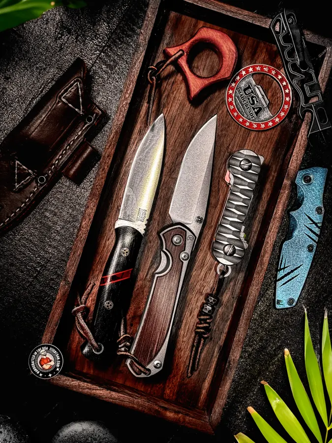 Layer Cake loaded with knives and a leather sheath at night