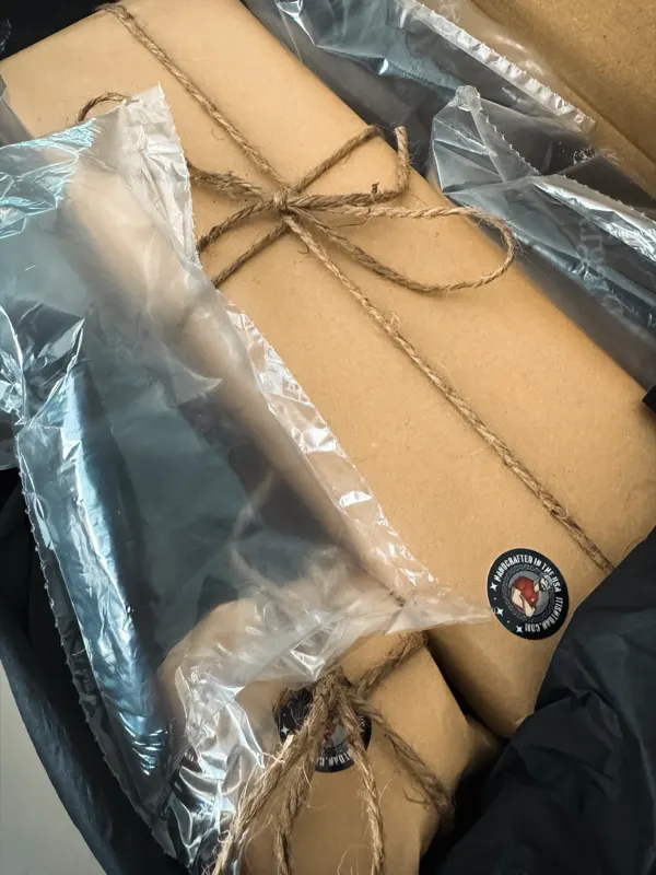 Layer Cake wrapped in kraft paper and twine, ready to ship