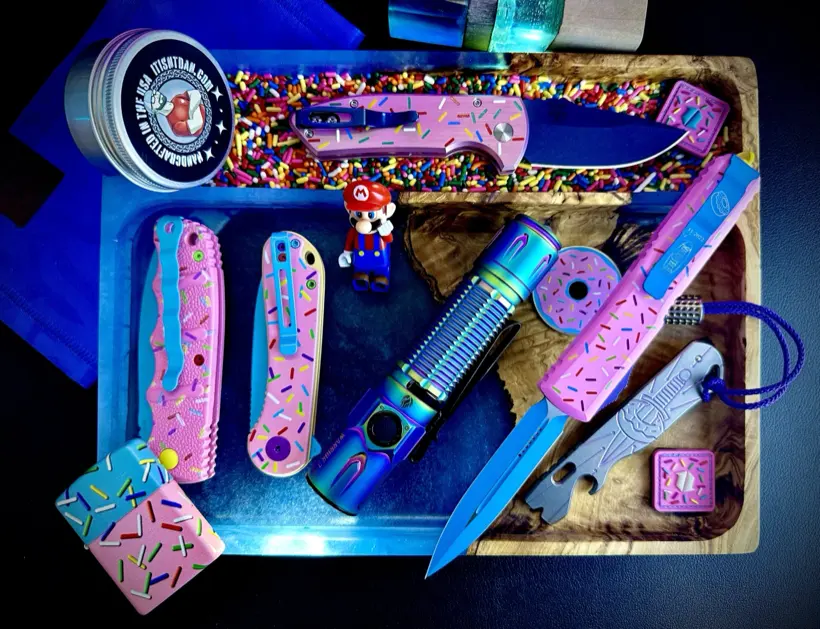 Showcase Tray loaded with pink donut themed knives