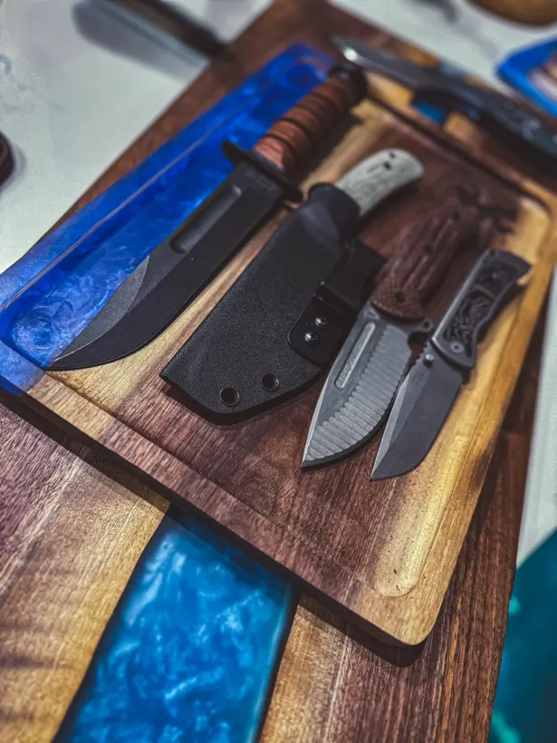 Fixed blades resting on a blue resin Showcase Tray
