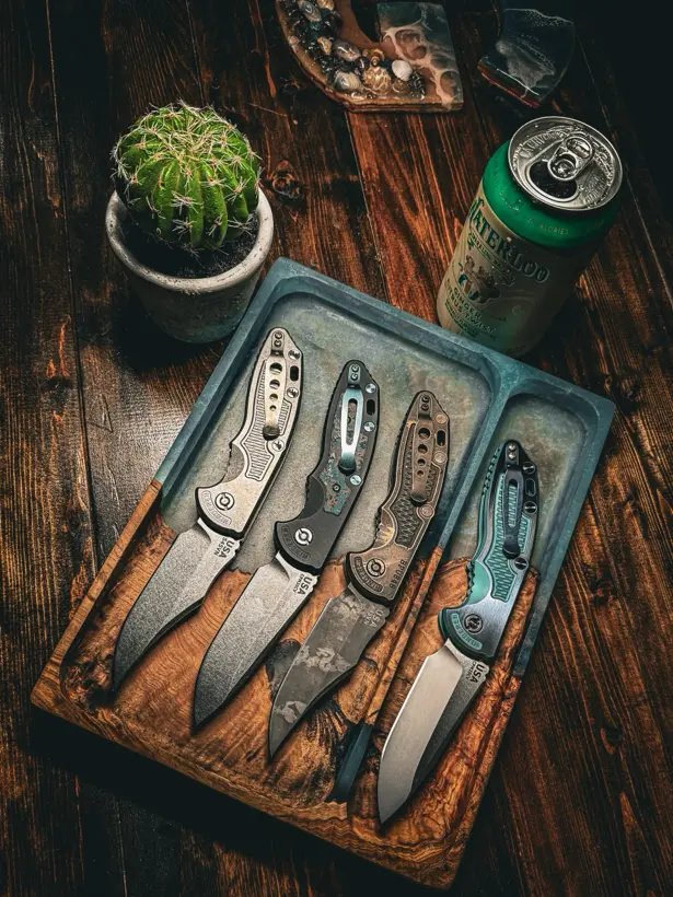 Showcase Tray with knives beside a cactus and a cold drink